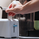 Illustration for article titled A Charging Station Camouflaged As a Toaster Banishes Crumbs and Cables